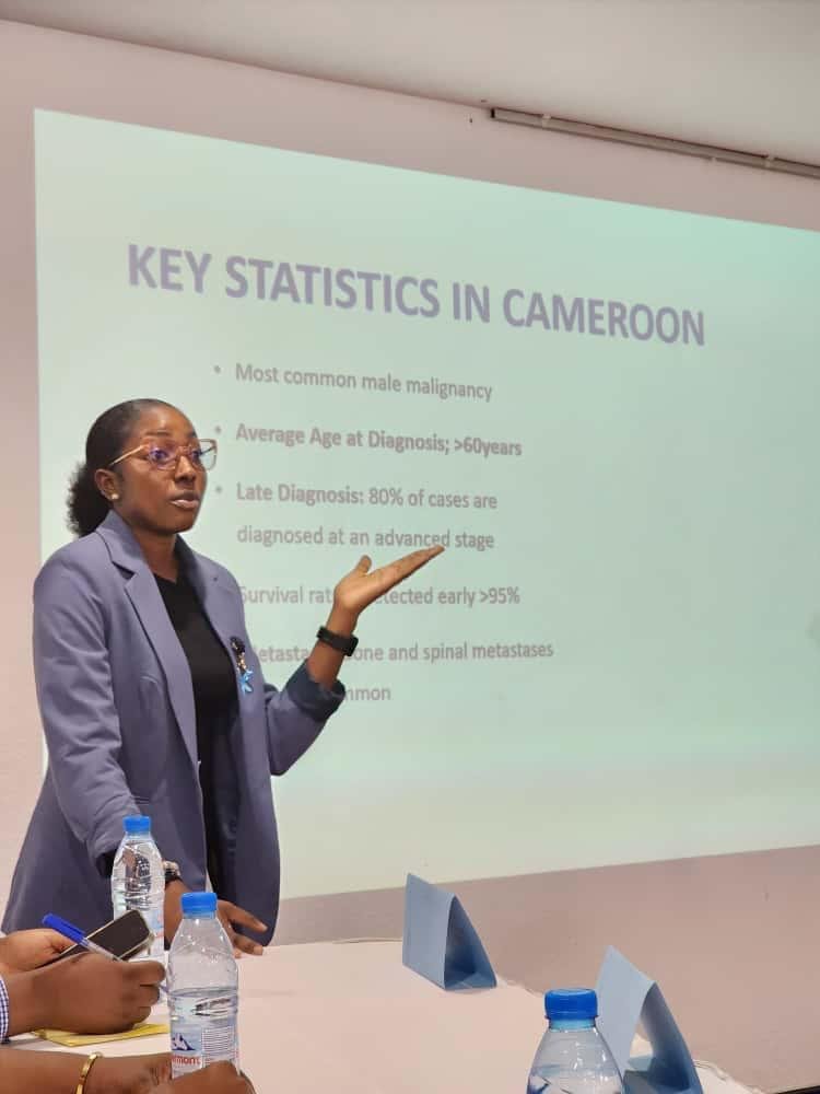 Dr. Ajui presenting health statistics