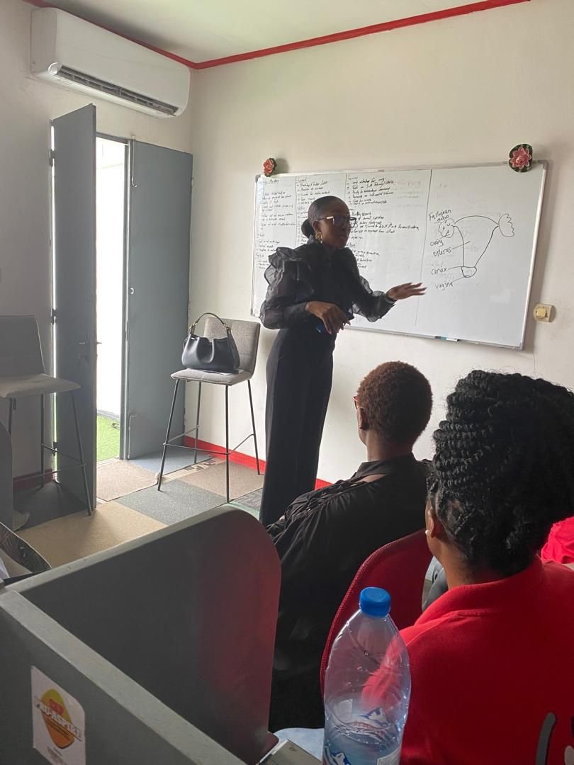 Dr. Ajui Massateh teaching reproductive health